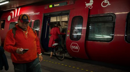 Train passengers in Copenhagen, Denmark, who are able bring bicycles aboard, on Sept. 5, 2019. Worldwide, incentivizing public transportation by making it cheaper and encouraging other mobility options, like walking or cycling, could save around 330,000 barrels a day of oil use, according to the International Energy Agency. (Charlotte de la Fuente/The New York Times)
