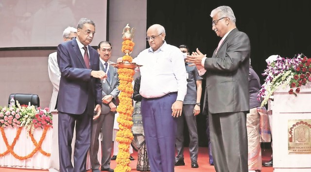 High Court Chief Justice Aravind Kumar with CM Bhupendra Patel at the conference of state judicial officers. (Express Photo) 