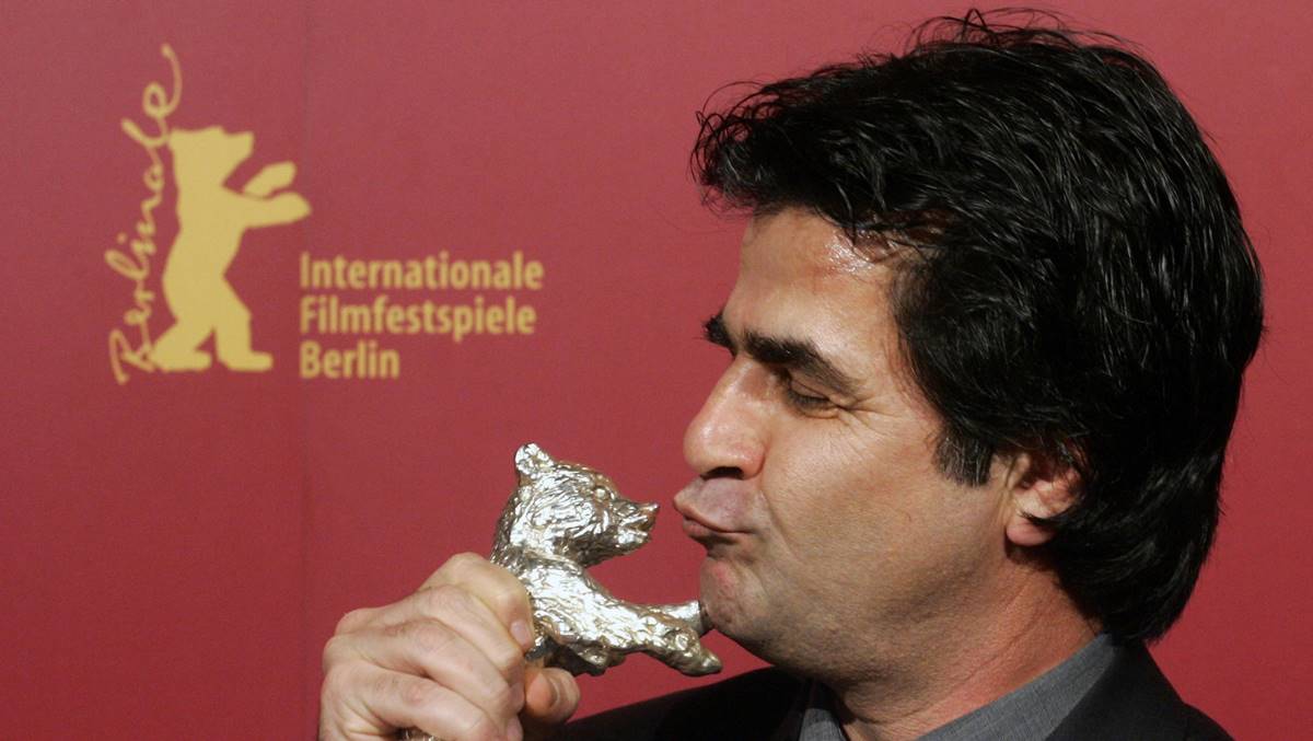 FILE - Iranian director Jafar Panahi poses with his Silver Berlin Bear award after the awarding ceremony at the 56th Berlinale International Film Festival in Berlin on Saturday, Feb. 18, 2006. (AP Photo/ File)