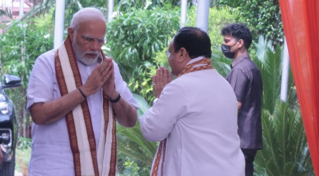 Prime Minister Narendra Modi being Welcome by BJP National President J.P. Nadda during the Mukhyamantri Parishad meeting, at BJP headquarters in New Delhi. (Express Photo by Amit Mehra)