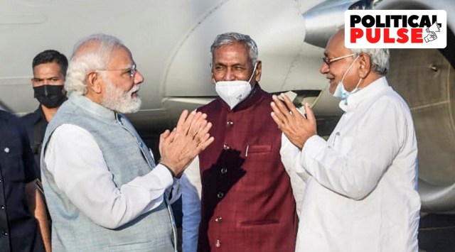 Prime Minister Narendra Modi being welcomed by Bihar Chief Minister Nitish Kumar upon his arrival at Jai Prakash Narayan Airport, in Patna, July 12, 2022. (PTI)