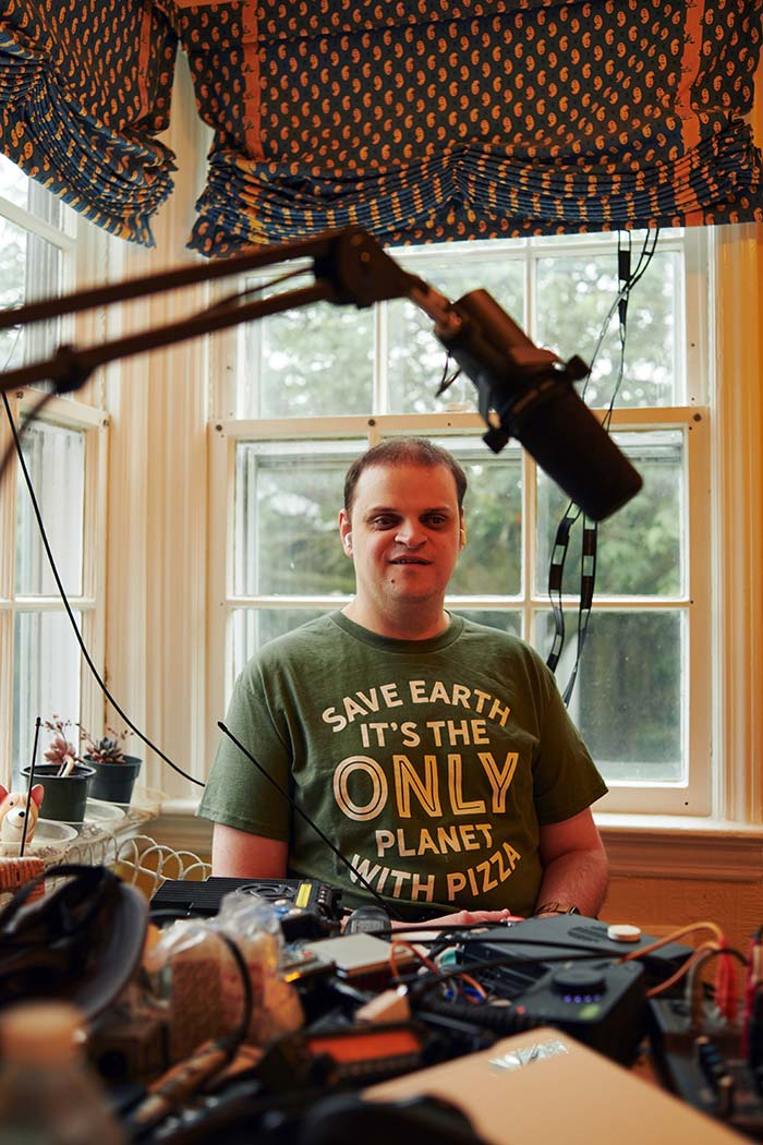 Picture of Patrick Perdue, a radio enthusiast who is blind, taken at his homes in Queens.