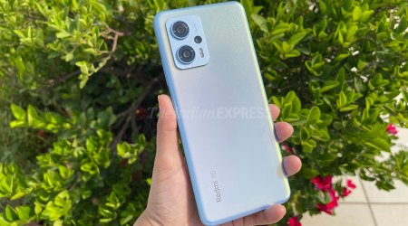 Redmi K50i in blue colour is seen in this photo
