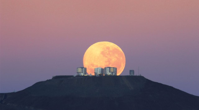 A dramatic moonset behind the ESO's (European Southern Observatory) Very Large Telescope in Chile, which was instrumental to ruling out the risk of the asteroid. (Image credit: G.Gillet/ESO)