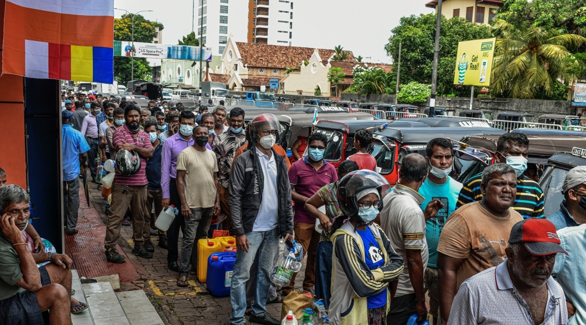People line up for fuel in Colombo, Sri Lanka, May 17, 2022. The fate of President Gotabaya Rajapaksa was uncertain on Saturday, July 9, after protesters stormed his residence and offices and sent him into hiding, and the nation’s political leaders asked him to step down. (Atul Loke/The New York Times)