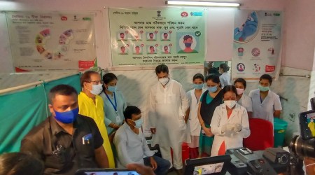 Chief Minister Dr. Manik Saha joins the inaugural event of administering precaution doses of COVID vaccine to all adults at Indira Gandhi Memorial hospital at Agartala earlier this month. (Express photo by Debraj Deb)
