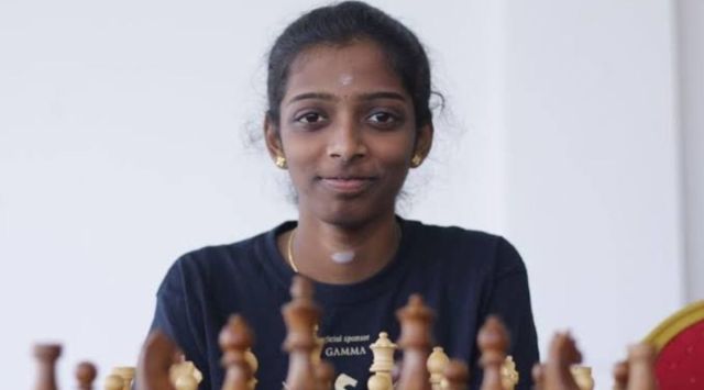 amidst the cacophony, R Vaishali sat restless, staring into the precisely arranged pieces, keenly waiting to make her first move. (Twitter)
