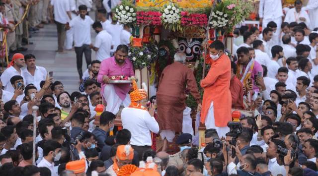 Gujarat CM Bhupendra Patel cleaned the path for Chariots with a golden broom marking the beginning for 145th Annual Rathyatra at Jagannath Temple in Jamalpur. (Express Photo by Nirmal Harindran)