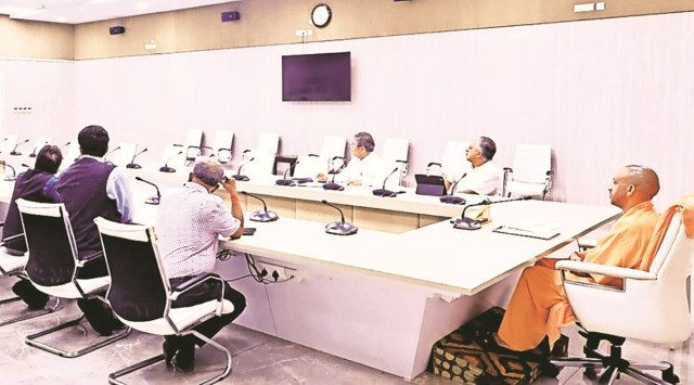 CM Yogi Adityanath during a meeting with officials in Lucknow, Saturday. (Express Photo)