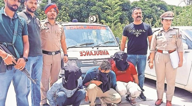 Mohali police with the accused on Sunday. (Express Photo)