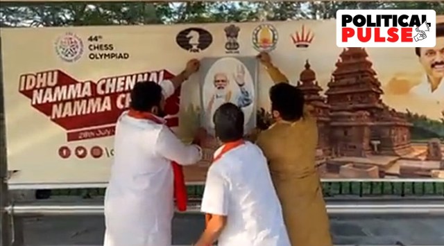BJP leaders putting up posters of PM Narendra Modi. (Twitter screengrab/ @AmarPrasadReddy)