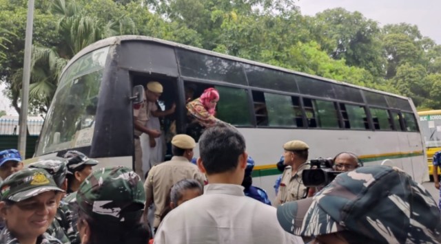 Delhi Police detains AICC workers as Sonia Gandhi and Rahul Gandhi head to ED office. (Express Photo)