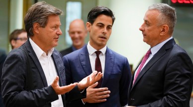 Germany's Minister for Climate Action Robert Habeck, left, speaks with Netherland's Minister for Climate Rob Jetten, center, and Czech Republic's Minister for Industry and Trade Josef Sikela during an emergency meeting of EU energy ministers in Brussels on July 26, 2022. (AP)