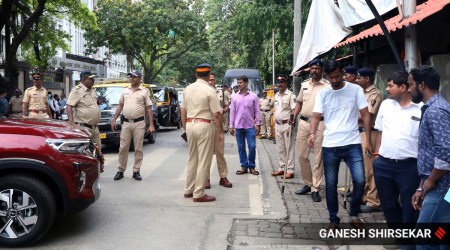 Sena workers outside the Thackeray family's Matoshree bungalow in June. (Express Photo By Ganesh Shirsekar)