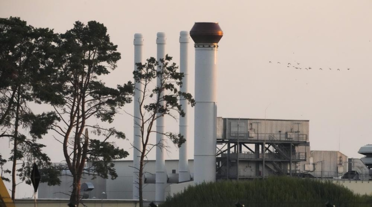 This photo shows the landfall facility of the Nord Stream 1 Baltic Sea pipeline and the transfer station of the OPAL gas pipeline, the Baltic Sea Pipeline Link, in Lubmin, Germany, Thursday, July 21, 2022. (AP Photo/Markus Schreiber)
