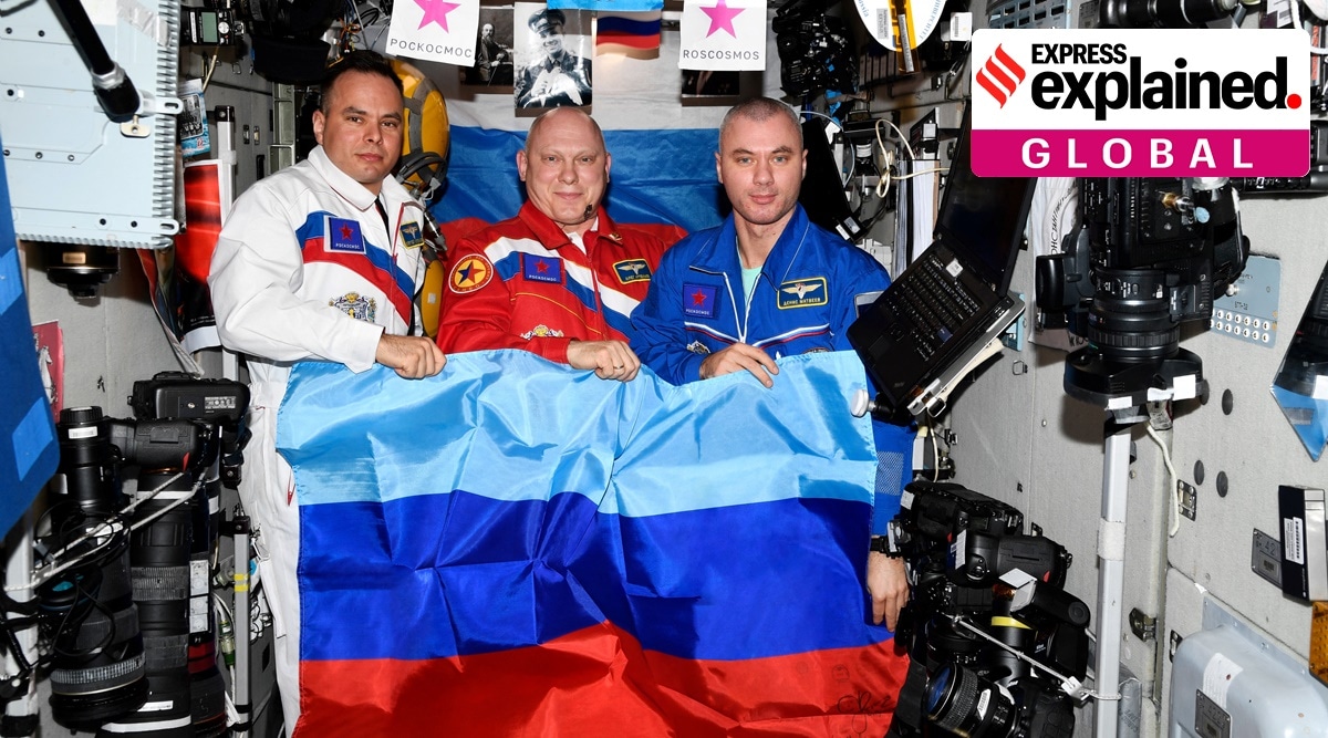 Russian cosmonauts  pose with a flag of the self-proclaimed Luhansk People's Republic at the International Space Station (ISS) (Roscosmos/Handout via REUTERS)