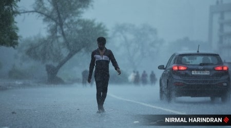 Moderate to heavy rains continues in parts of Ahmedabad city on Thursday. (Express photo by Nirmal Harindran)