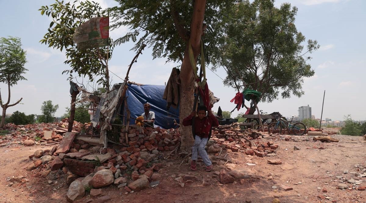 Mohammad Hadish Ansari, a daily wager, and his family continue to live in temporary sheds on the debris of their demolished home at Khori Gaon in Faridabad. Amit Mehra