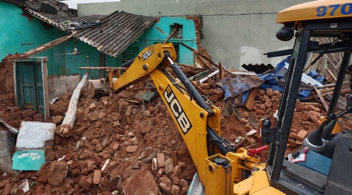 Earthmovers employed by the GHMC demolishing dilapidated structures as part of monsoon preparedness. (Credit: GHMC)