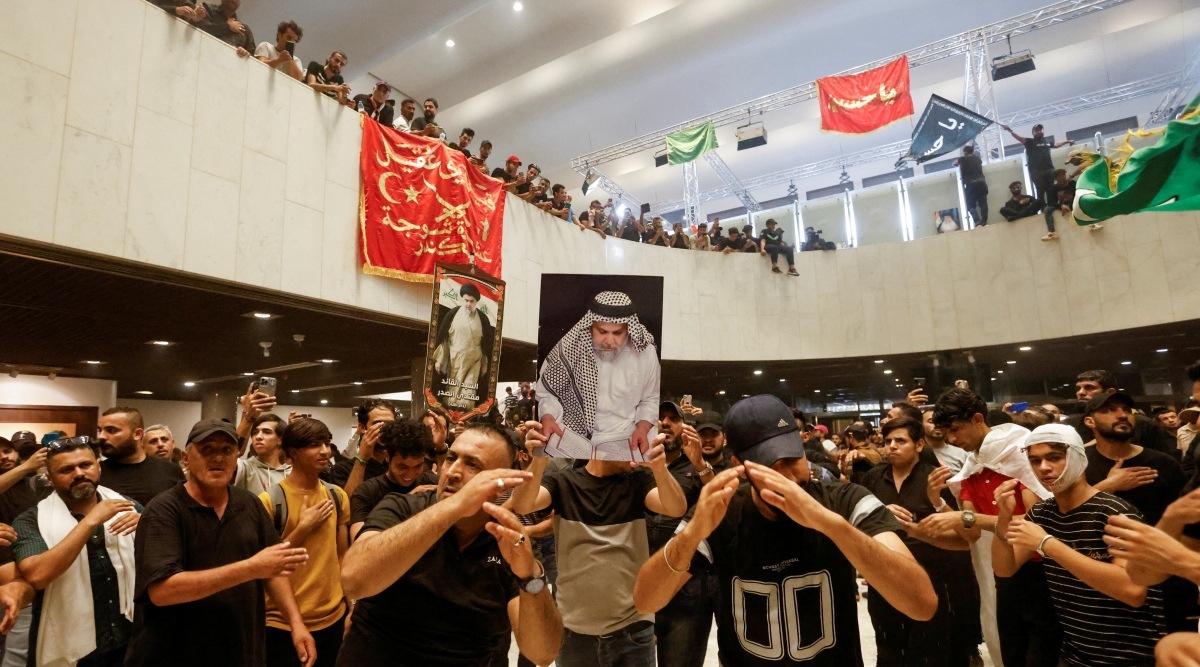 Supporters of Iraqi Shi'ite cleric Moqtada al-Sadr protest against corruption inside the Parliament, in Baghdad, Iraq July 30, 2022. (Reuters)