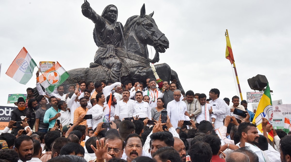 KPCC President D K Shivakumar with party workers during a protest over summoning of party's interim President Sonia Gandhi by ED in the National Herald Case, in Hubballi, Friday (PTI Photo)