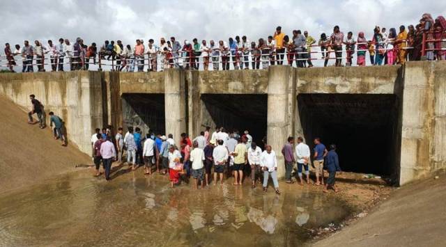 A crowd cheers as Narmada water reaches Kutch. (Express photo)