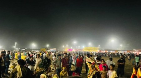 A view of Amarnath pilgrims having dinner at langars set up near Banihal Toll Plaza at Lamber in Ramban district. (Express photo)