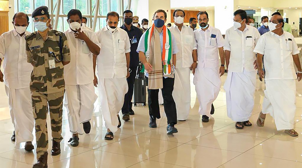 Congress leader Rahul Gandhi being received by party leaders upon his arrival at the Kannur International Airport, Friday (PTI Photo)  