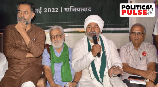 Activist Yogendra Yadav with farmer leaders Darshan Pal and Rakesh Tikait during a meeting of Samyukta Kisan Morcha, in Ghaziabad. (PTI)