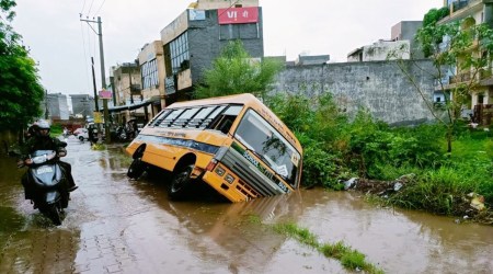 Panchkula: Students narrowly escape as bus gets stuck in drain due to submerged road