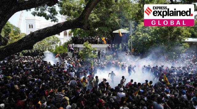 Police use teargas as protesters storm Prime Minister Ranil Wickremesinghe’s office compound in Colombo, Wednesday. (AP)