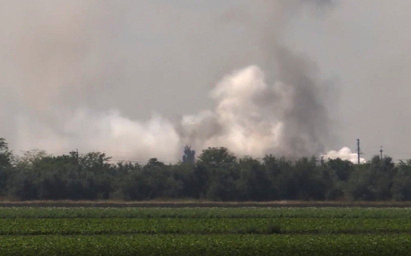 In this image taken from video provided by the RU-RTR Russian television on Tuesday, Aug. 16, 2022, smoke rises over the site of explosion at an ammunition storage of Russian army near the village of Mayskoye, Crimea. Explosions and fires ripped through an ammunition depot in Russian-occupied Crimea on Tuesday in the second suspected Ukrainian attack on the peninsula in just over a week, forcing the evacuation of more than 3,000 people. (RU-RTR Russian Television via AP) 