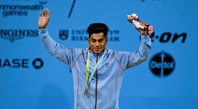 Achinta Sheuli with the gold medal after winning the men's 73kg weightlifting category match of the Commonwealth Games 2022 (CWG), in Birmingham, UK. (PTI Photo)