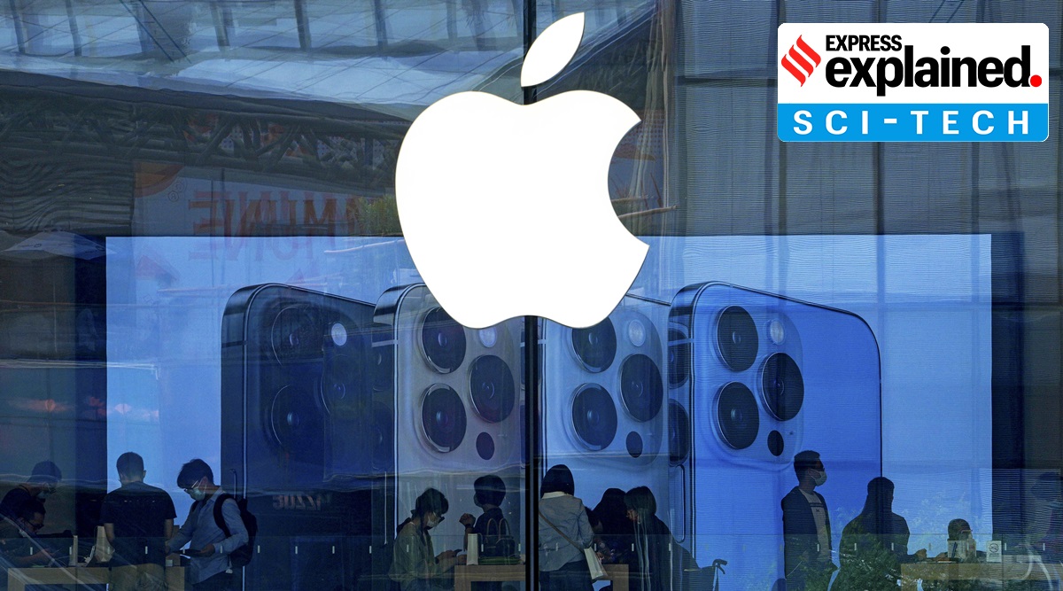 People shop at an Apple Store in Beijing. Apple disclosed serious security vulnerabilities for iPhones, iPads and Macs. The software flaws could potentially allow attackers to take complete control of these devices, Apple said. (AP Photo/Andy Wong, File)