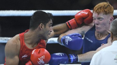 India's Ashish Kumar exchanges punches with Aaron Bowen of England during the men's Light Heavy (75-80 Kg) category boxing quarter-final match at the Commonwealth Games 2022 (CWG), in Birmingham, UK, Wednesday, Aug 3, 2022. (PTI Photo/Swapan Mahapatra) 
