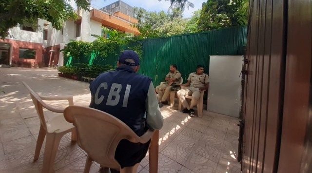 CBI officials at the residence of Delhi Deputy CM Manish Sisodia, in New Delhi on Friday. (Express Photo: Gayathri Mani)