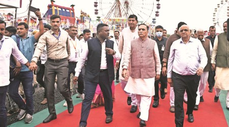 CM Bhupendra Patel and former CM Vijay Rupani after inaugurating the Janmashtami Mela in Rajkot. (Express)
