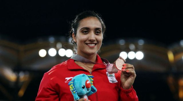 Bronze medalist Navjeet Dhillon on the CWG 2018 Gold Coast podium. (Photo: Reuters)