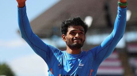 India's Eldhose Paul celebrates after winning gold. (REUTERS/Phil Noble)