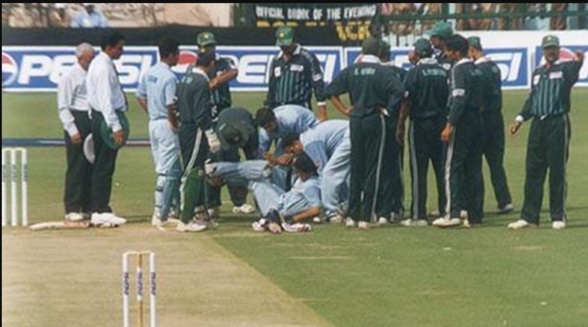 Sourav Ganguly is helped to his feet after being hit on the rib cage by a Shoaib Akhtar delivery in an ODI in 1999. (File Photo/PCB)