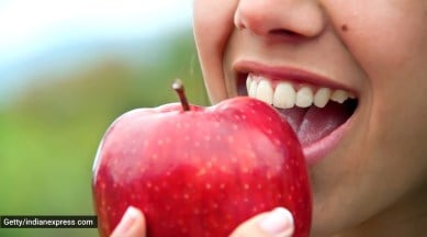 apples, eating apples, what makes apples healthy, eating apple in the morning, apple health benefits, apple versus coffee, natural sugar, healthy diet, indian express news