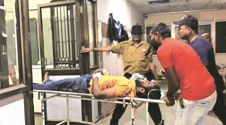 The injured accused is brought to the SSG Hospital in Vadodara. (Express Photo)