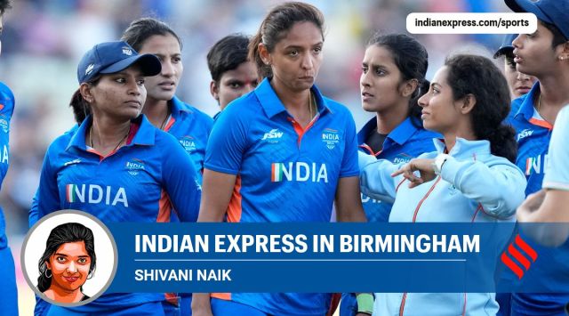 India's captain Harmanpreet Kaur, center, reacts after their loss in the women's cricket T20 final match against Australia at Edgbaston at the Commonwealth Games in Birmingham. (AP)