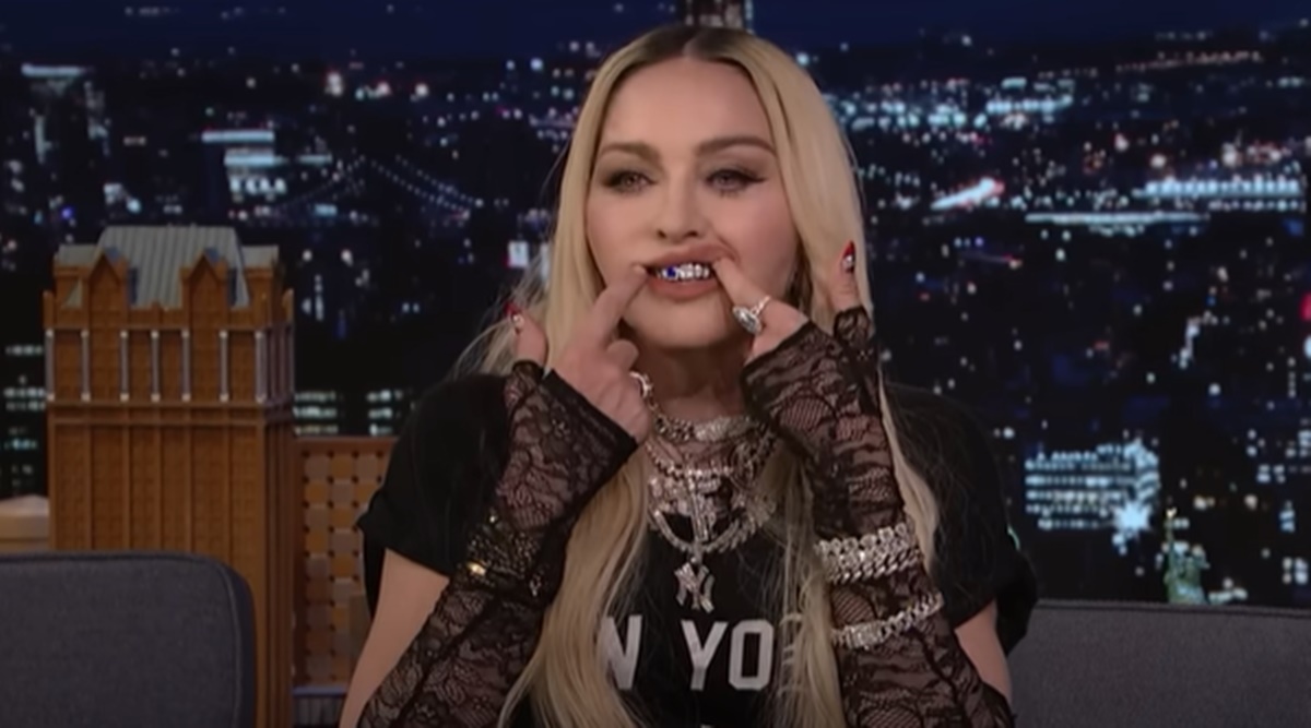 Madonna wears a grill and it looks awful