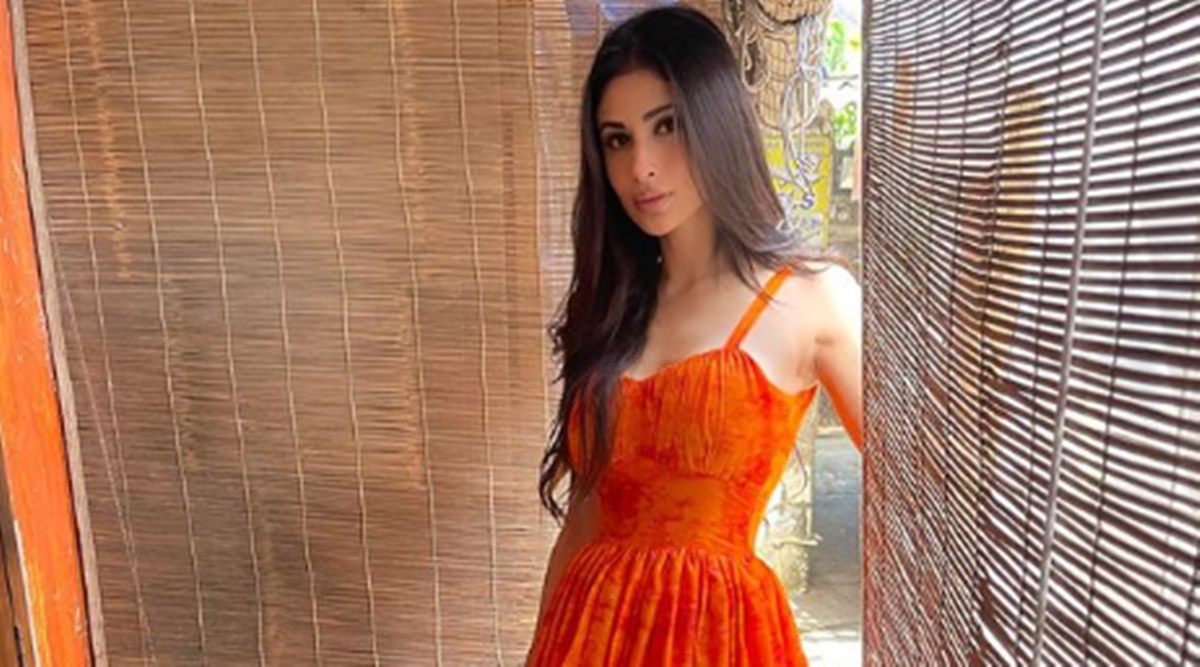 mouni roy orange dress Mouni Roy looks bold & bright in an orange slip ensemble as she poses for her latest photo-shoot : Bollywood News