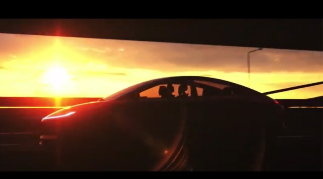 Ola Electric did not reveal much about the vehicle but the silhoutte of the vehicle shown in a video during the livestream depicts a sedan with a "fastback" roof. (Image credit: Ola Electric / Screenshot via YouTube)