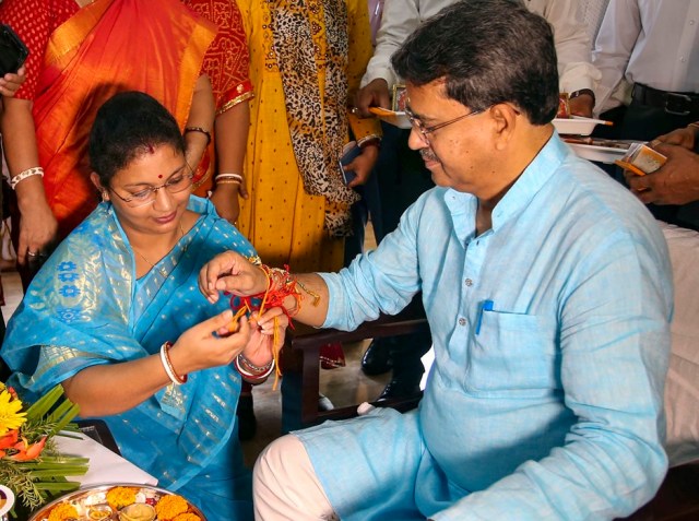 Agartala: A woman ties a rakhi on the wrist of Tripura Chief Minister Dr. Manik Saha on the occasion of the Raksha Bandhan festival, in Agartala, Thursday, Aug 11, 2022. (PTI Photo) 