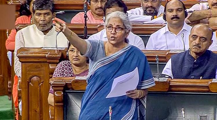 Union Finance Minister Nirmala Sitharaman speaks in the Lok Sabha during the ongoing Monsoon Session of Parliament, in New Delhi. (PTI)