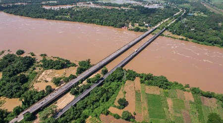 Subarnarekha river flows over the danger mark owing to heavy monsoon rainfall at Rajghat near Jaleswar in Balasore district. (PTI)
