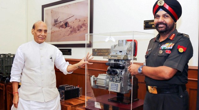 Union Defence Minister Rajnath Singh hands over an indigenously-developed equipment to the Indian Army, in New Delhi, Aug. 16, 2022. (PTI)
